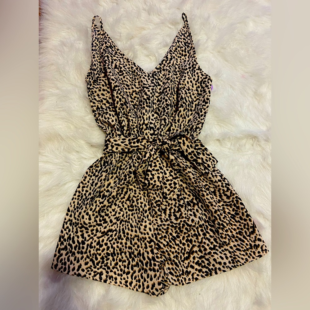 Never worn leopard romper, size medium